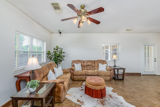 6249 Mallard Dr, Katy, TX 77493 - living area featuring plenty of natural light, visible vents, and a ceiling fan