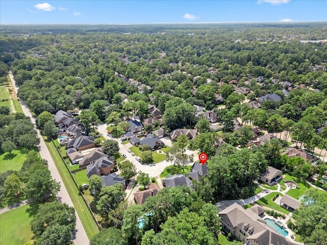 bird's eye view with a residential view and a view of trees