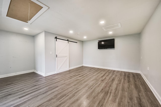 3626 Lake Breeze Ln, Crosby, TX 77532 - basement with baseboards, wood finished floors, visible vents, and recessed lighting