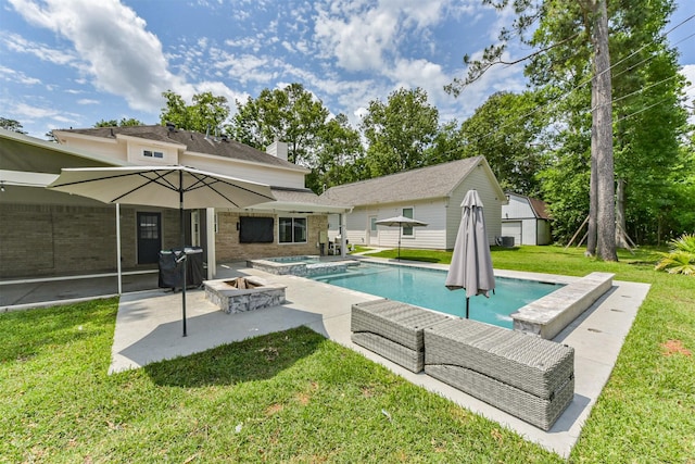 3626 Lake Breeze Ln, Crosby, TX 77532 - view of pool with a yard, a patio, and a pool with connected hot tub