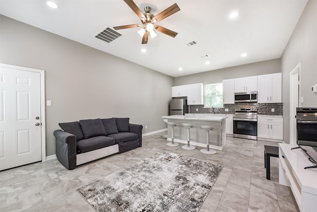 3626 Lake Breeze Ln, Crosby, TX 77532 - living room with baseboards, visible vents, recessed lighting, and ceiling fan
