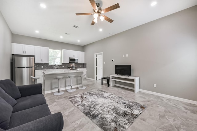 3626 Lake Breeze Ln, Crosby, TX 77532 - living area with baseboards, a ceiling fan, visible vents, and recessed lighting
