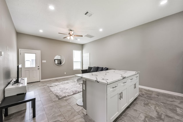 3626 Lake Breeze Ln, Crosby, TX 77532 - kitchen with a ceiling fan, visible vents, and plenty of natural light