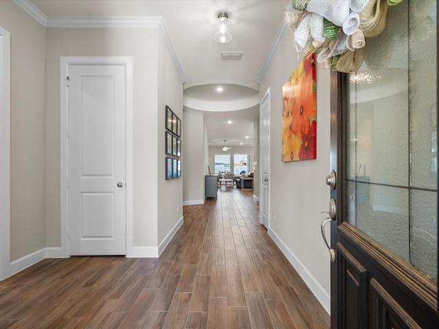 7262 Monarch Dr, Katy, TX 77493 - corridor featuring visible vents, baseboards, dark wood-style floors, ornamental molding, and recessed lighting