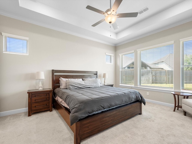 7262 Monarch Dr, Katy, TX 77493 - bedroom with crown molding, light colored carpet, visible vents, and a raised ceiling