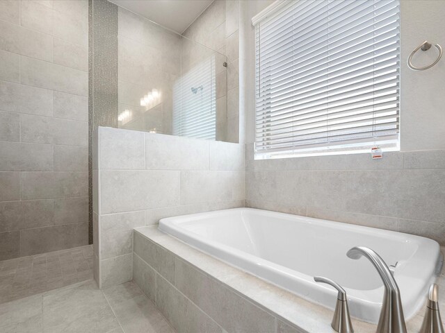 7262 Monarch Dr, Katy, TX 77493 - full bath with a walk in shower, tile walls, and a bath