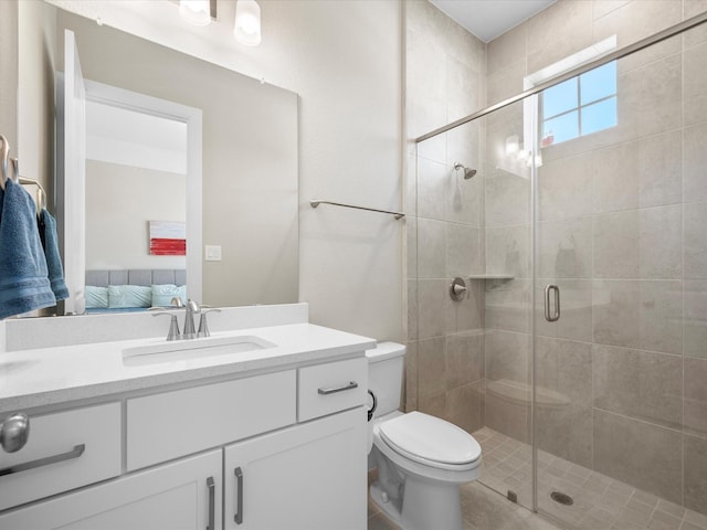 7262 Monarch Dr, Katy, TX 77493 - ensuite bathroom with vanity, a stall shower, toilet, and connected bathroom