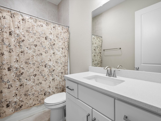7262 Monarch Dr, Katy, TX 77493 - full bathroom featuring toilet, tile patterned floors, a shower with shower curtain, and vanity