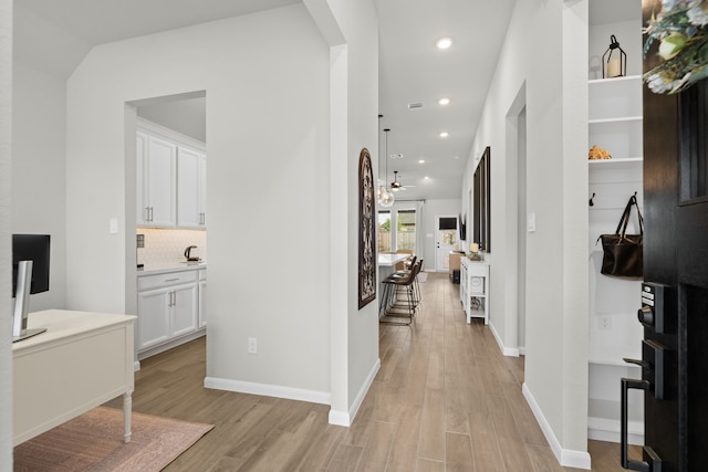 21131 Austin Chalk Dr, Cypress, TX 77433 - corridor featuring recessed lighting, light wood-style flooring, and baseboards