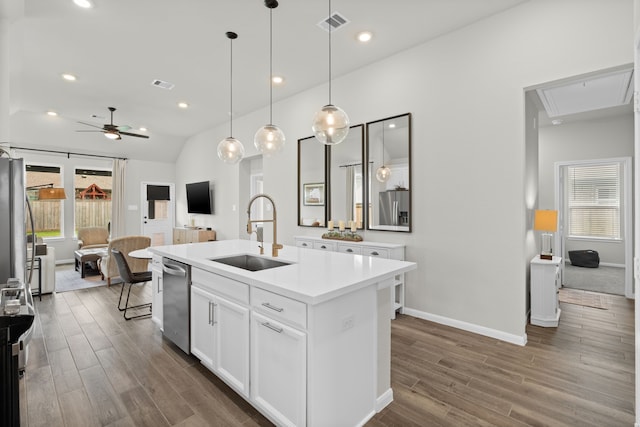 21131 Austin Chalk Dr, Cypress, TX 77433 - kitchen featuring stainless steel dishwasher, a sink, dark wood finished floors, visible vents, and a ceiling fan