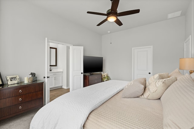 21131 Austin Chalk Dr, Cypress, TX 77433 - bedroom with ensuite bathroom, ceiling fan, and light wood-style flooring