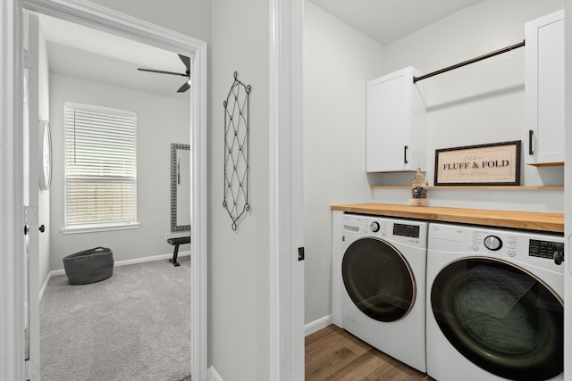 21131 Austin Chalk Dr, Cypress, TX 77433 - laundry room with a ceiling fan, baseboards, cabinet space, and washer and clothes dryer