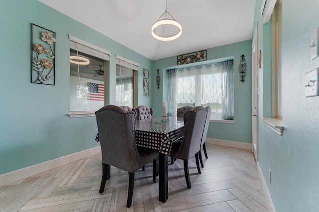 dining space with baseboards