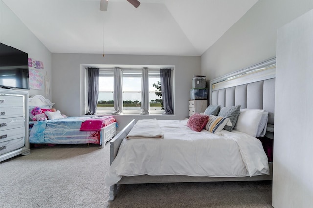 bedroom featuring lofted ceiling, carpet floors, and ceiling fan