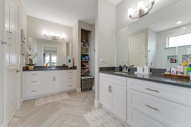 bathroom featuring vanity and a tile shower