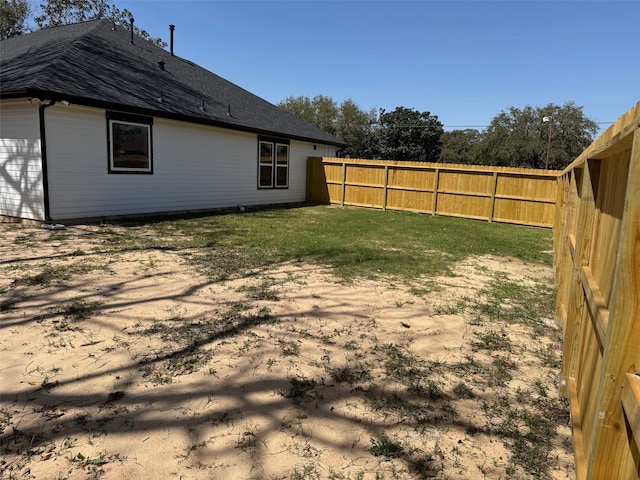view of yard featuring a fenced backyard