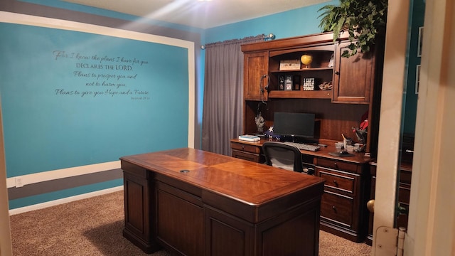 office with light colored carpet and baseboards
