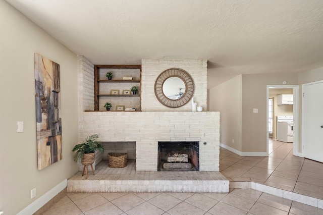 unfurnished living room featuring tile patterned floors, a textured ceiling, built in features, baseboards, and a brick fireplace