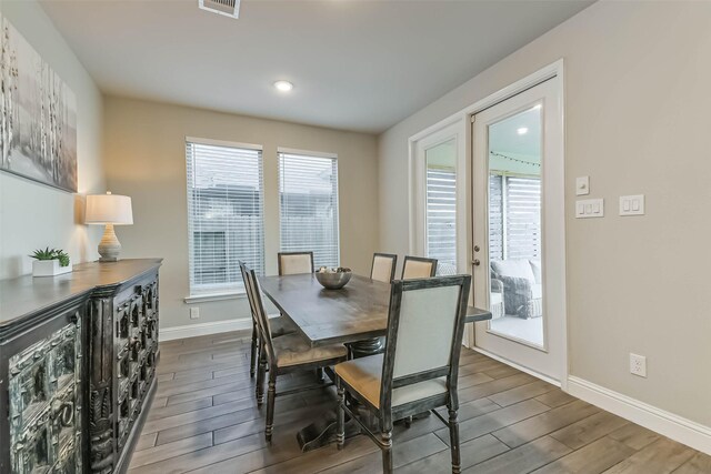 19219 Filly Park Cir, Tomball, TX 77377 - dining space with baseboards, wood finished floors, and recessed lighting