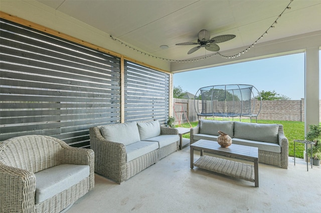 19219 Filly Park Cir, Tomball, TX 77377 - view of patio / terrace featuring a trampoline, outdoor lounge area, ceiling fan, and a fenced backyard
