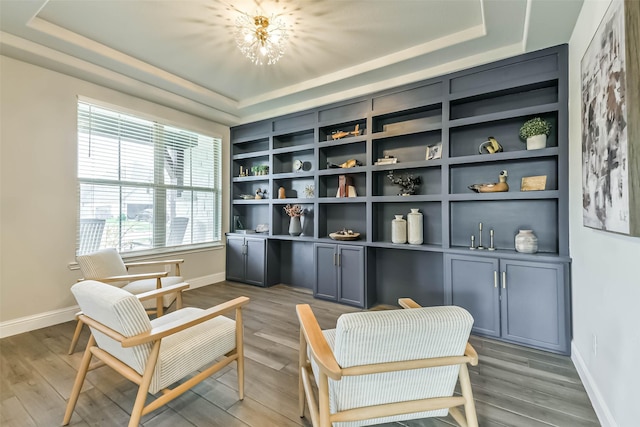 19219 Filly Park Cir, Tomball, TX 77377 - sitting room with a tray ceiling, healthy amount of natural light, baseboards, and wood finished floors