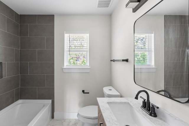 full bath with vanity, marble finish floor, baseboards, toilet, and visible vents
