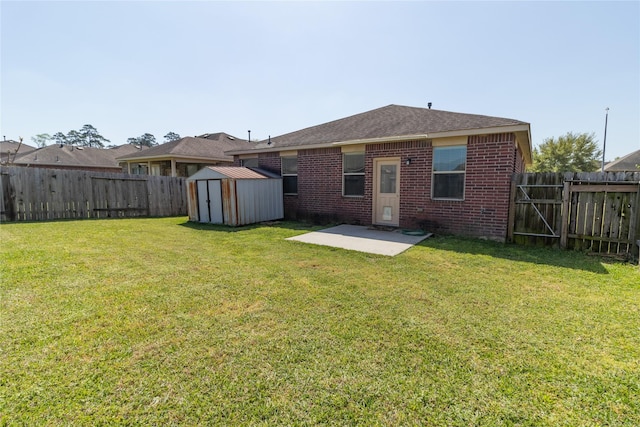 21527 Cotton Valley Ln, Porter, TX 77365 - back of house with brick siding, a patio area, a shed, and a fenced backyard