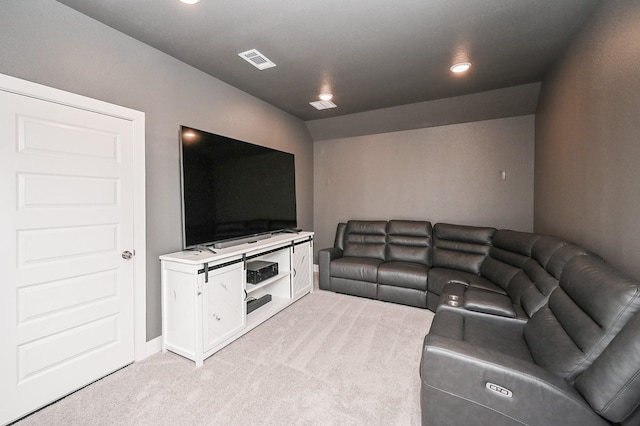 living room featuring baseboards, visible vents, recessed lighting, and light colored carpet