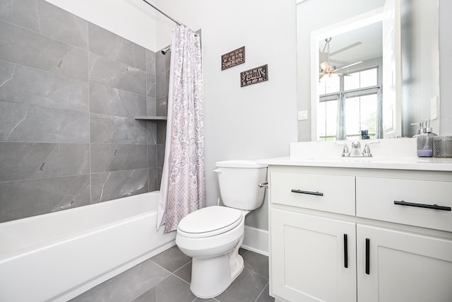 full bathroom featuring toilet, baseboards, shower / tub combo, a ceiling fan, and vanity