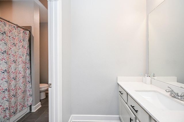 full bathroom featuring tile patterned flooring, toilet, vanity, and curtained shower