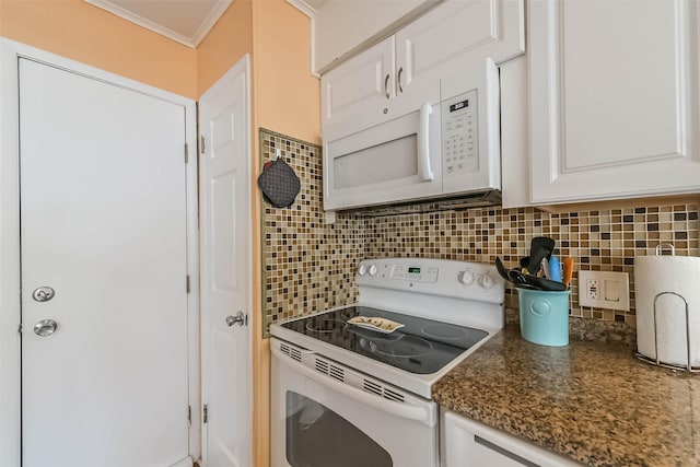 kitchen featuring white cabinetry, decorative backsplash, ornamental molding, and white appliances