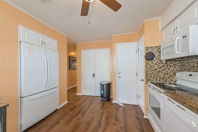 kitchen with dark wood-style flooring, white appliances, ceiling fan, backsplash, and ornamental molding