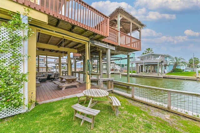 view of dock featuring a deck with water view