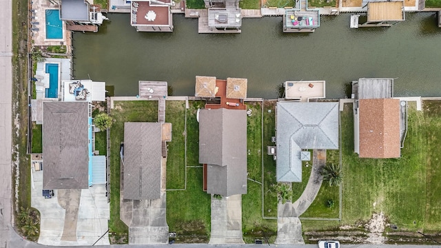 bird's eye view with a water view