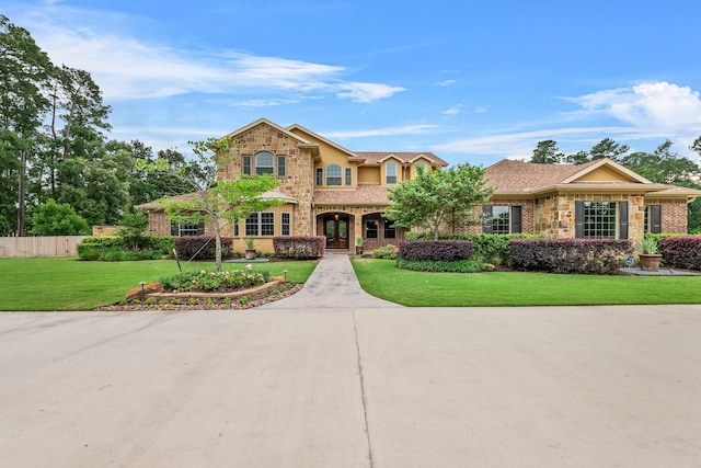 28002 Whispering Maple Way, Spring, TX 77386 - traditional home featuring french doors and stone siding
