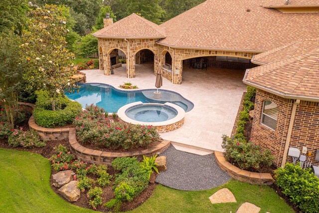 28002 Whispering Maple Way, Spring, TX 77386 - view of pool with a patio area and a pool with connected hot tub