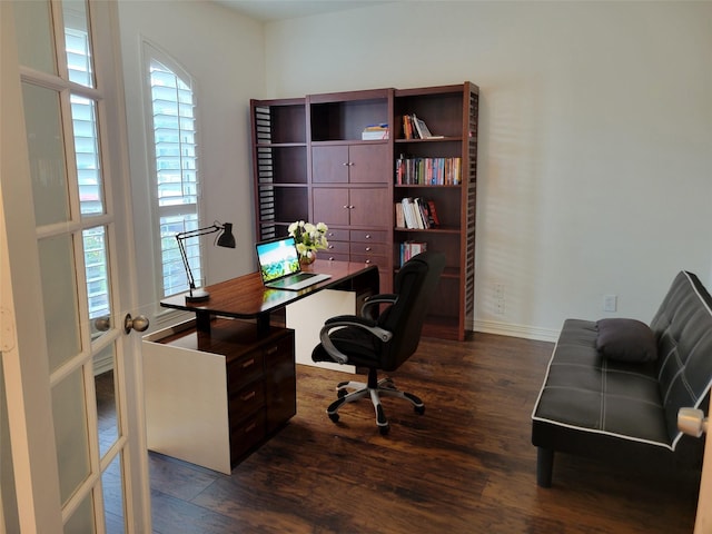 home office with dark wood-style flooring, baseboards, and plenty of natural light