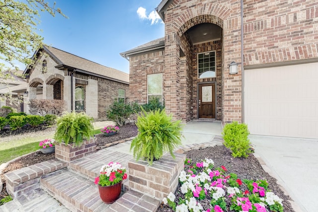 doorway to property with brick siding