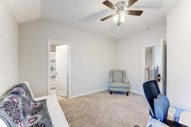 office space with carpet floors, lofted ceiling, baseboards, and ceiling fan
