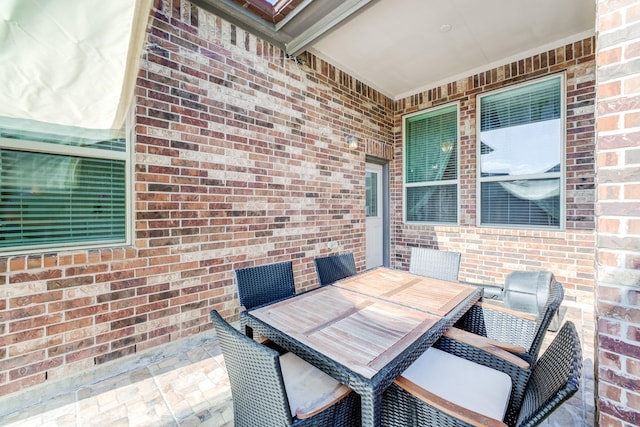 view of patio featuring outdoor dining space
