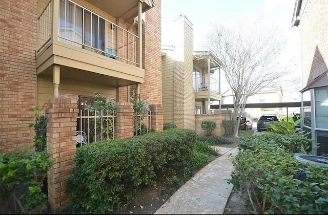 11201 Lynbrook Dr Unit 3703, Houston, TX 77042 - view of side of home featuring brick siding