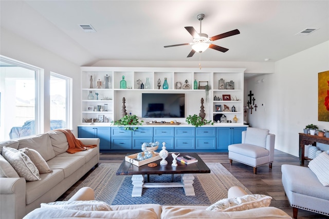 1818 Regent Mill Dr, Missouri City, TX 77459 - living area featuring vaulted ceiling, a ceiling fan, dark wood-type flooring, and visible vents