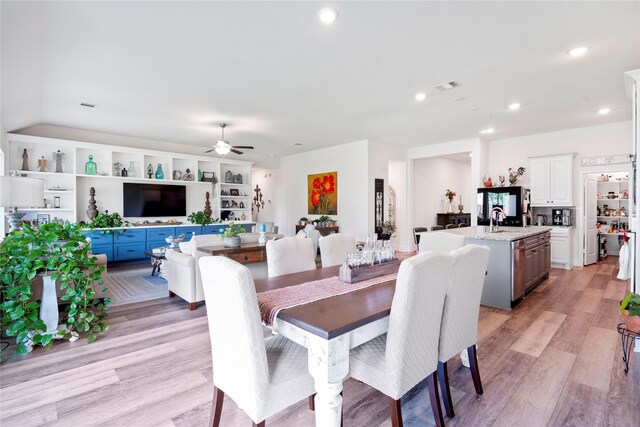 1818 Regent Mill Dr, Missouri City, TX 77459 - dining room with recessed lighting, a ceiling fan, visible vents, and light wood-type flooring
