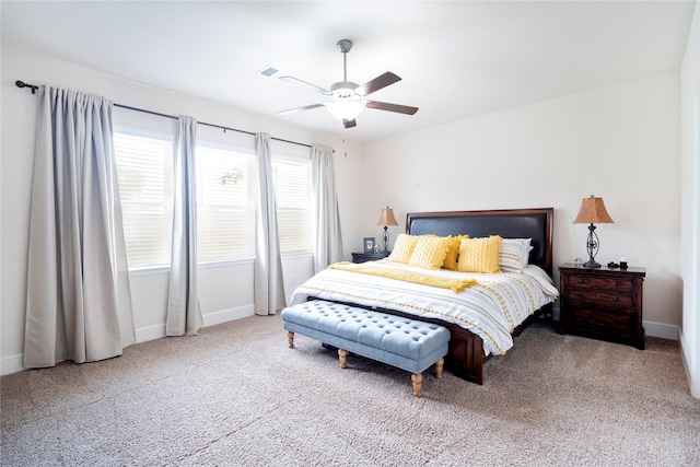 1818 Regent Mill Dr, Missouri City, TX 77459 - carpeted bedroom with baseboards and ceiling fan