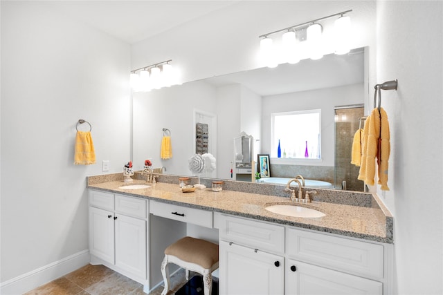 1818 Regent Mill Dr, Missouri City, TX 77459 - full bath featuring double vanity, tile patterned flooring, baseboards, and a sink