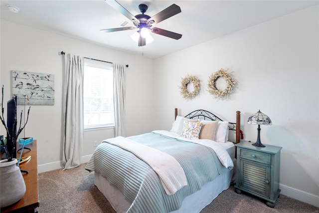 1818 Regent Mill Dr, Missouri City, TX 77459 - carpeted bedroom with baseboards and ceiling fan
