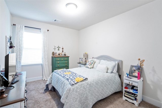 1818 Regent Mill Dr, Missouri City, TX 77459 - bedroom with baseboards, carpet flooring, and visible vents