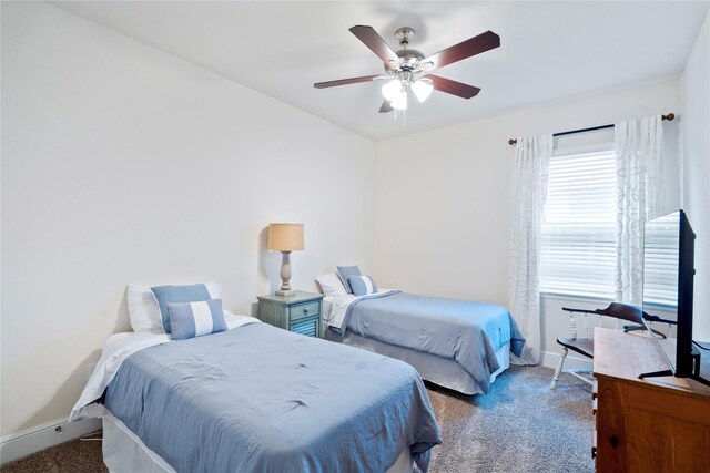1818 Regent Mill Dr, Missouri City, TX 77459 - carpeted bedroom with baseboards and ceiling fan