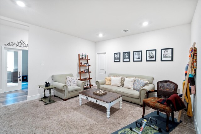 1818 Regent Mill Dr, Missouri City, TX 77459 - carpeted living area with baseboards, visible vents, and recessed lighting