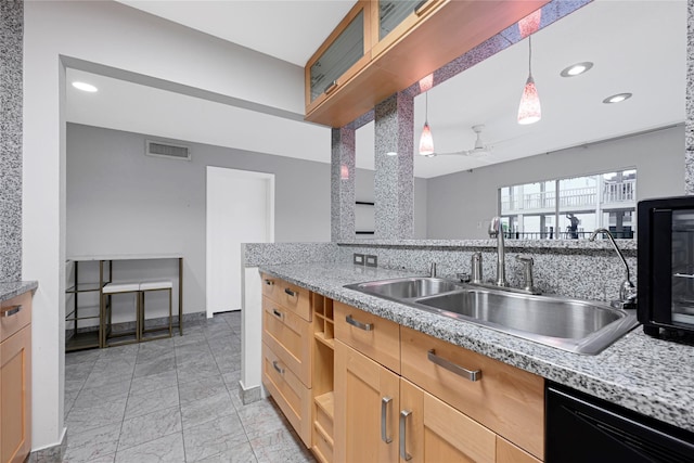 kitchen featuring light brown cabinets, a sink, dishwasher, visible vents, and recessed lighting